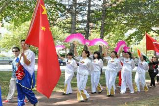 Chinese Flag and people in parade