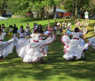 Colombian Dance Group in field
