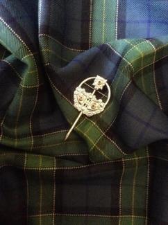 green tartan with gold pin